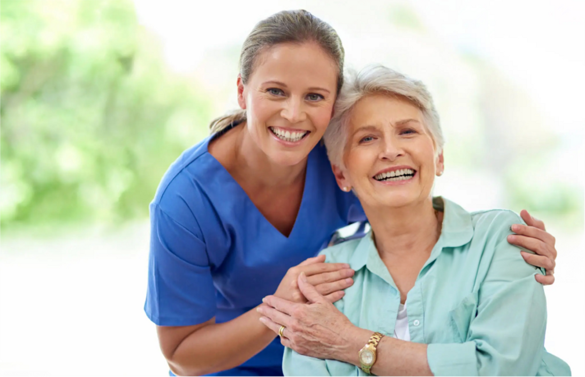 nurse standing with older lady